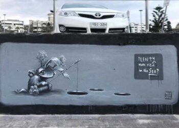 unveiling-the-power-of-street-art-exploring-the-message-infused-murals-by-a-talented-artist